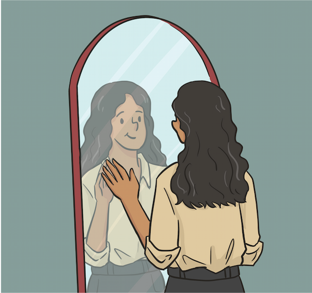 Woman looking in the mirror
